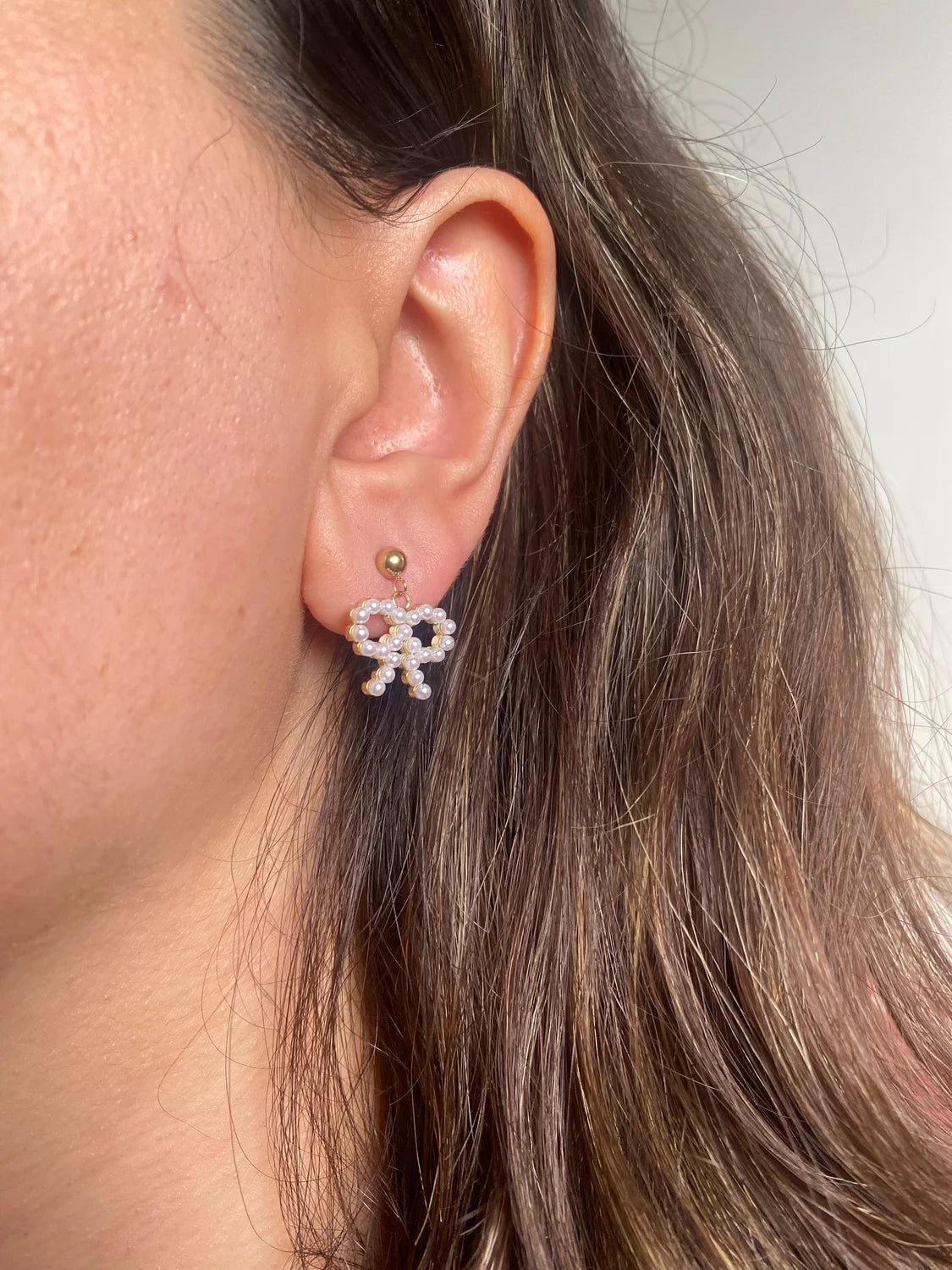 Boucles d’oreilles nœud perlé doré en acier inoxydable